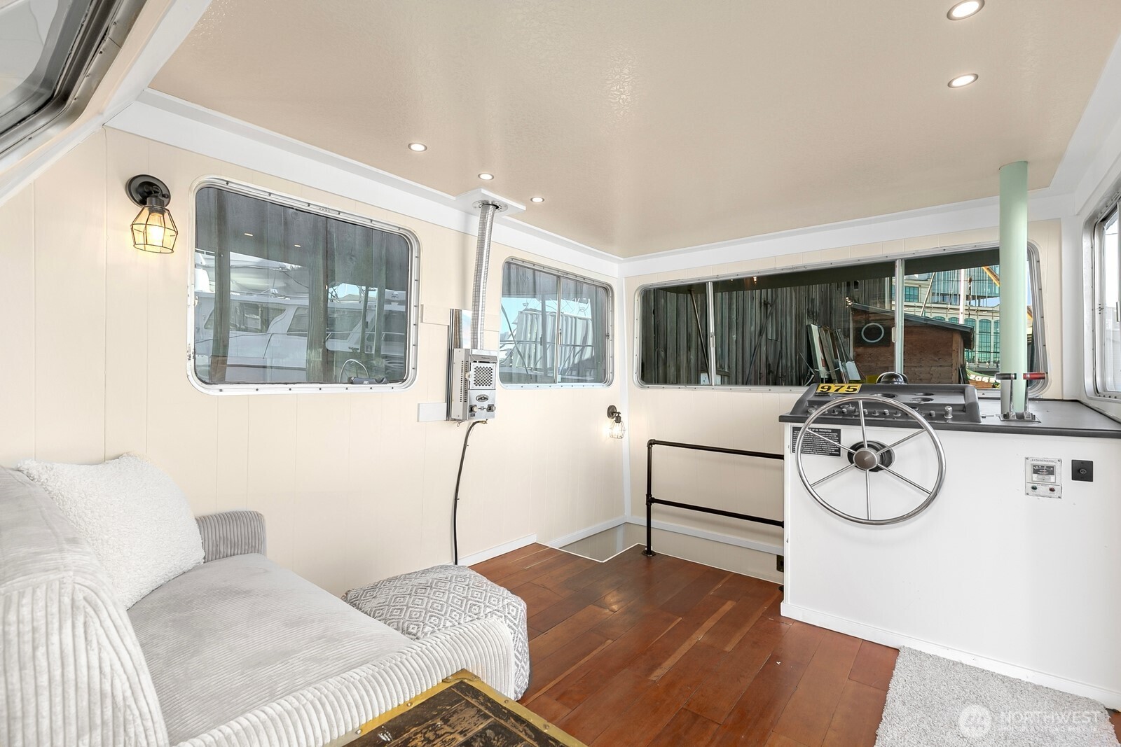 1325 Fairview Avenue North Seattle, WA 98109 - Photo 9 of 23 a living room with furniture a table and white walls