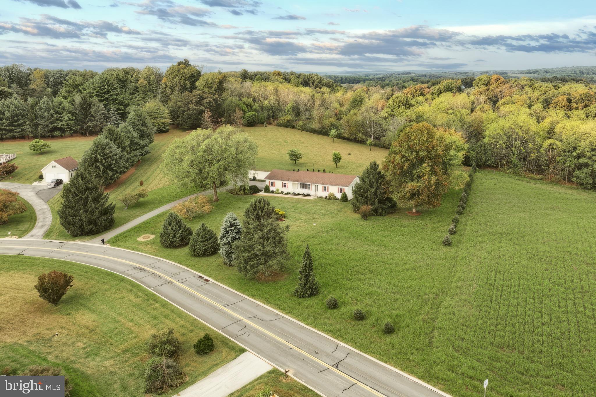 5040 Rocky Road Glenville, PA 17329 - Photo 44 of 49 Serene countryside retreat with lush greenery.