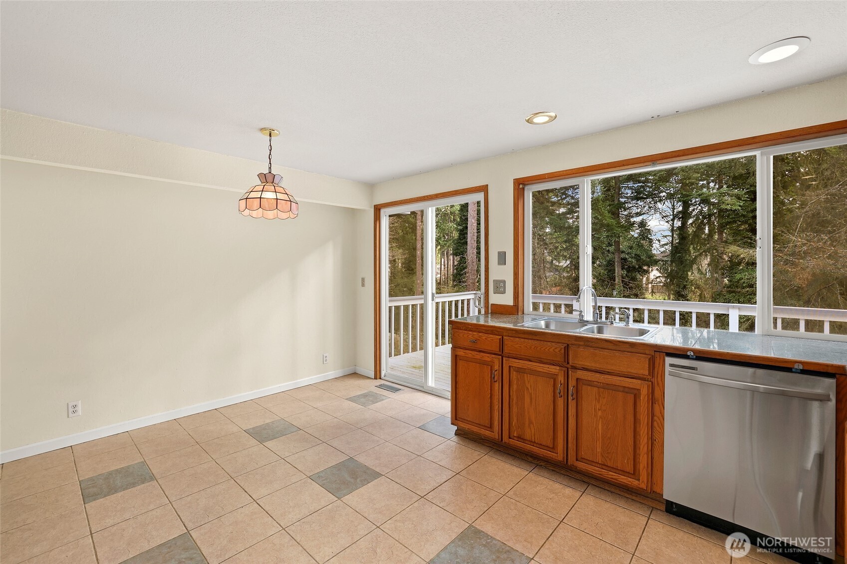 33524 33rd Place Southwest Federal Way, WA 98023 - Photo 11 of 37 a large white kitchen with a large window