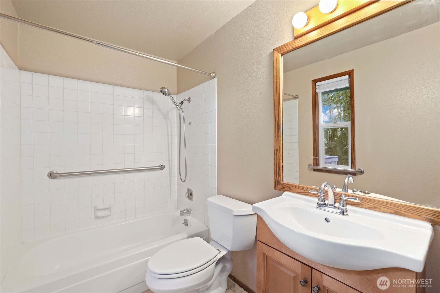 33524 33rd Place Southwest Federal Way, WA 98023 - Photo 15 of 37 a bathroom with a sink toilet and shower