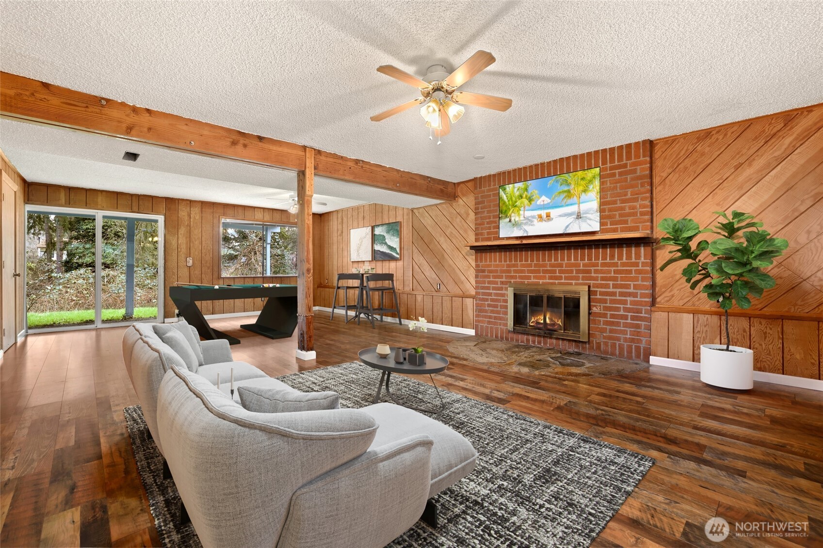 33524 33rd Place Southwest Federal Way, WA 98023 - Photo 21 of 37 a living room with furniture a fireplace and a flat screen tv