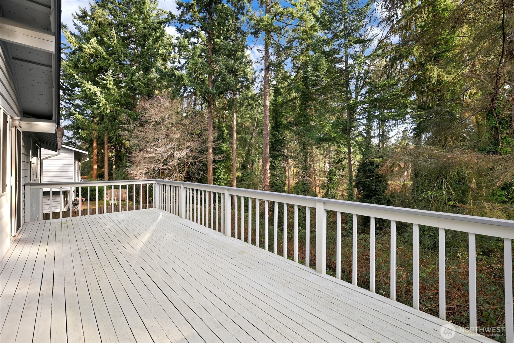 33524 33rd Place Southwest Federal Way, WA 98023 - Photo 25 of 37 a balcony with trees in front of it