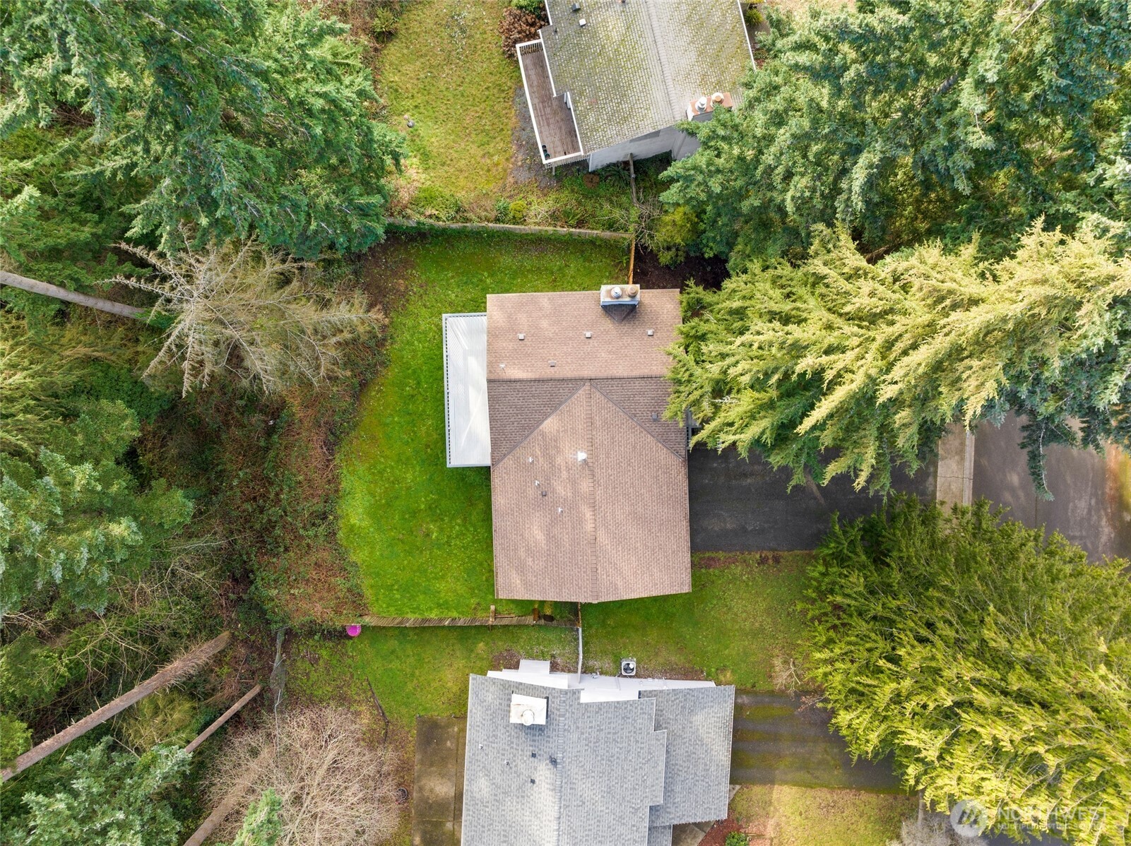 33524 33rd Place Southwest Federal Way, WA 98023 - Photo 31 of 37 an aerial view of a house with a garden and lake view