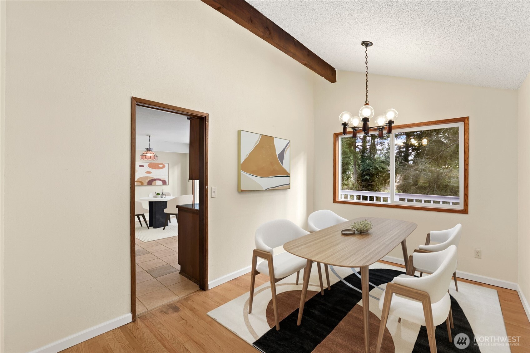 33524 33rd Place Southwest Federal Way, WA 98023 - Photo 7 of 37 a view of a dining room with furniture a chandelier and wooden floor