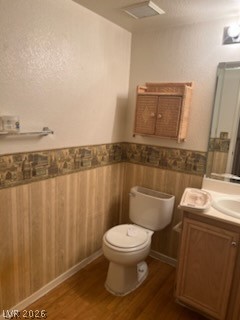 8070 West Russell Road, Unit 1057 Las Vegas, NV 89113 - Photo 6 of 10 Functional bathroom with wood-look flooring and a vanity offering essential storage.