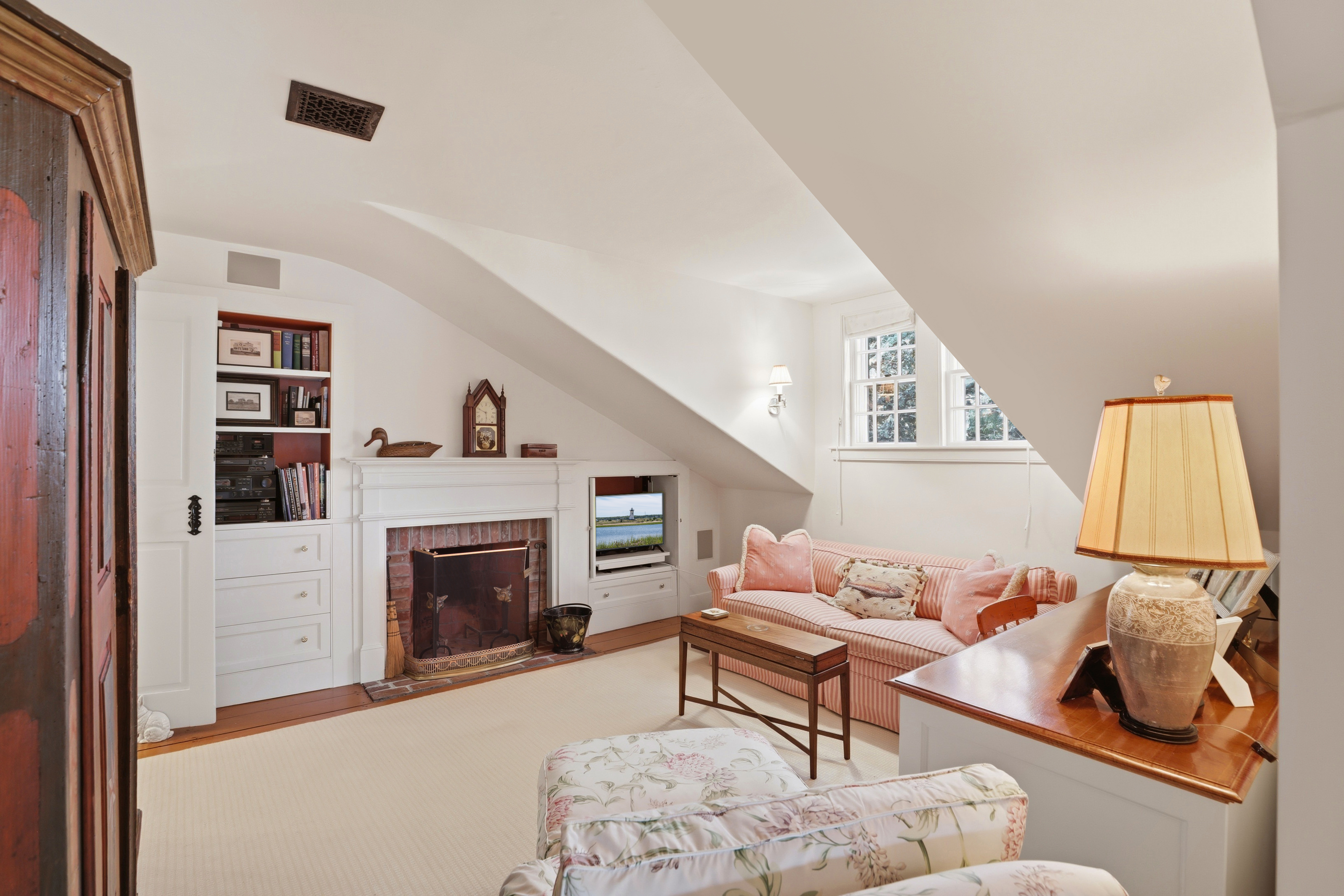 14 Thayer Street Edgartown, MA 02539 - Photo 31 of 43 a living room with furniture and a fireplace