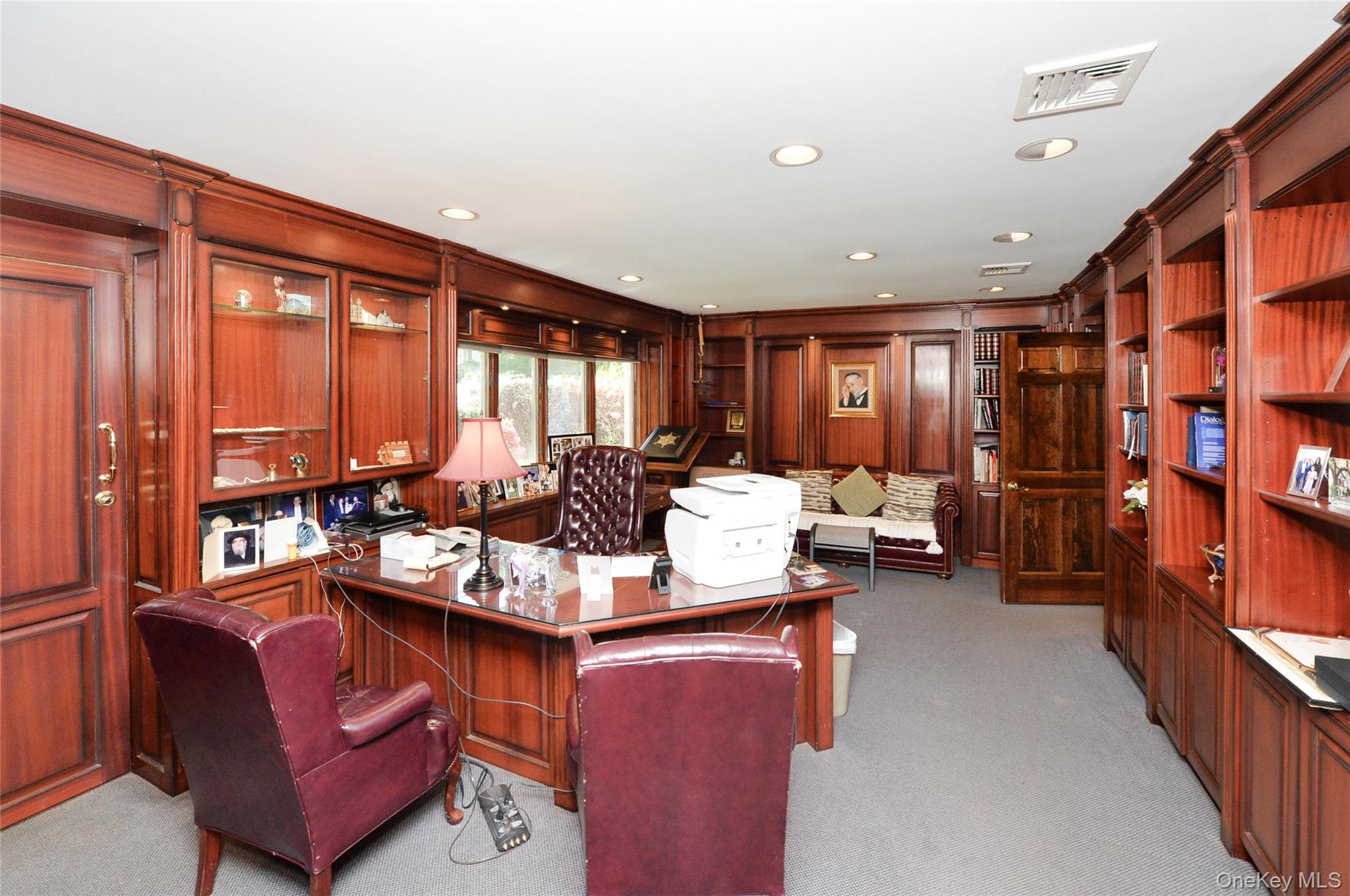 24 Highview Road Monsey, NY 10952 - Photo 10 of 44 a living room with furniture a large window and bookshelf