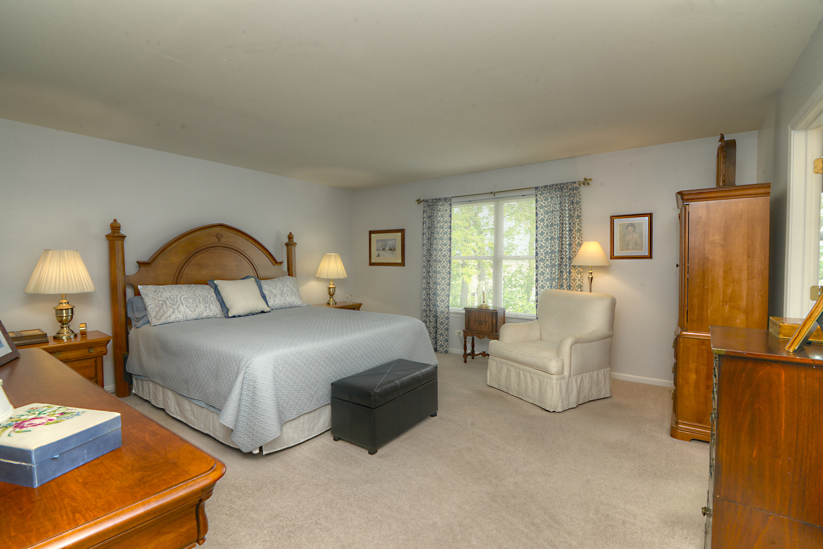 285 Ridge Road North Aurora, IL 60542 - Photo 12 of 24 a bedroom with bed and a flat screen tv