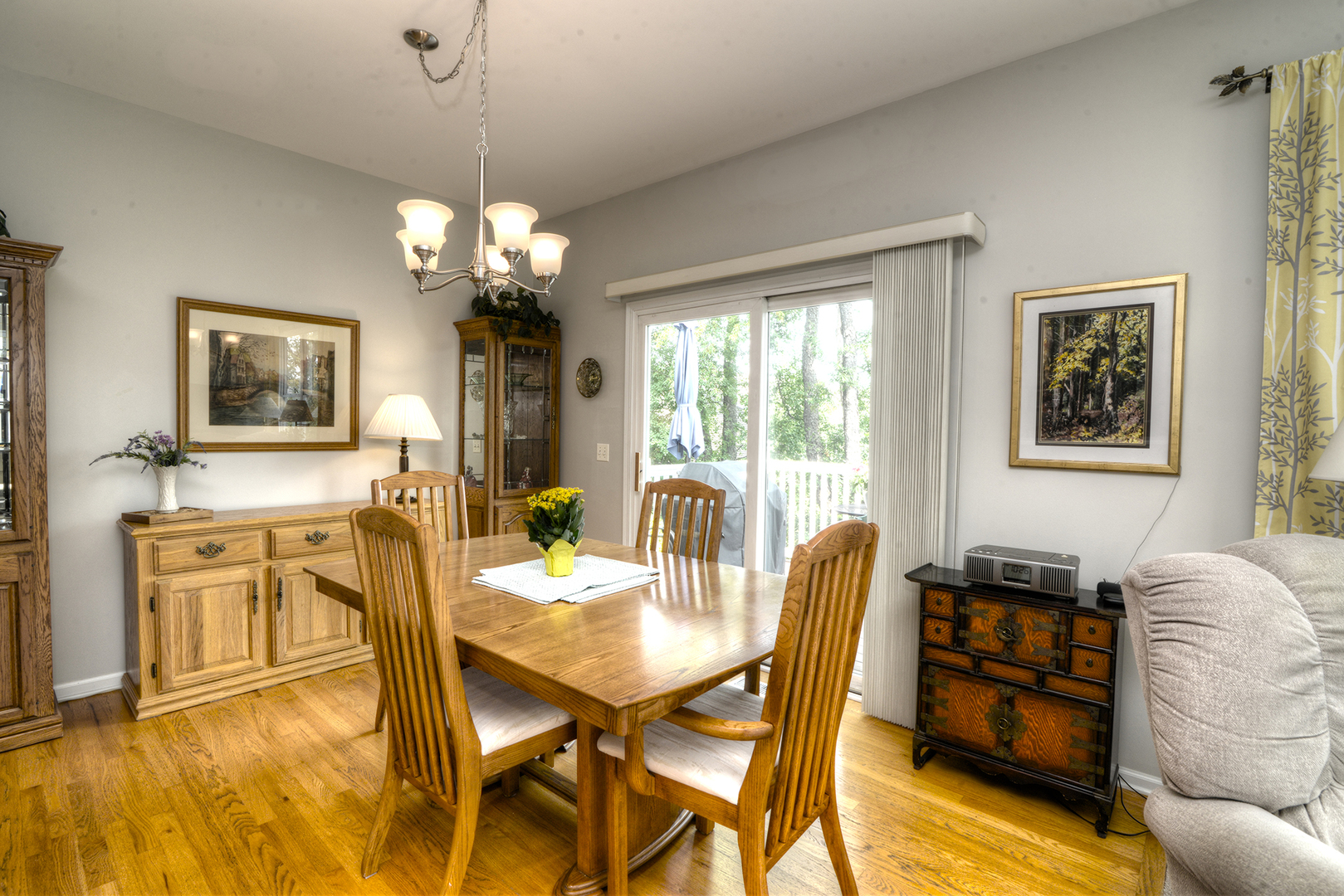 285 Ridge Road North Aurora, IL 60542 - Photo 8 of 24 a view of a dining room with furniture window and wooden floor