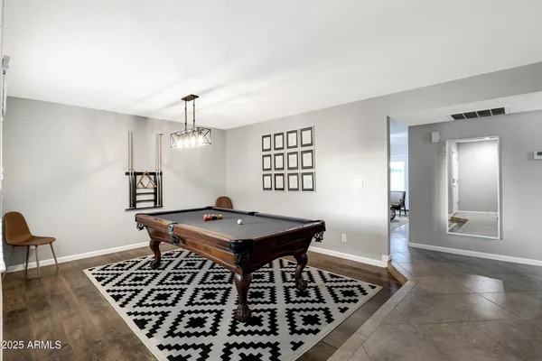 a view of a livingroom with furniture and window