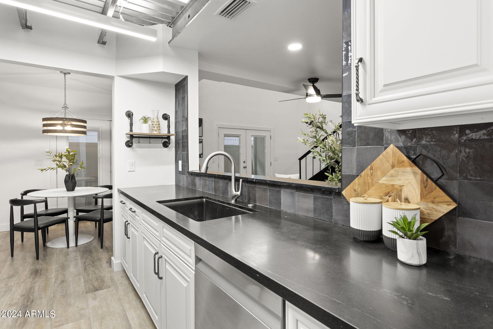3136 North 38th Street, Unit 1 Phoenix, AZ 85018 - Photo 16 of 42 Visit with your guests while cooking!