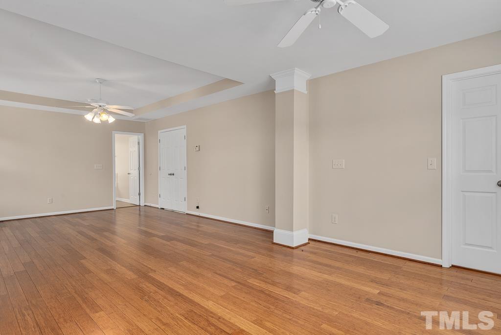 110 Castlebar Lane Durham, NC 27713 - Photo 17 of 32 a view of an empty room with wooden floor