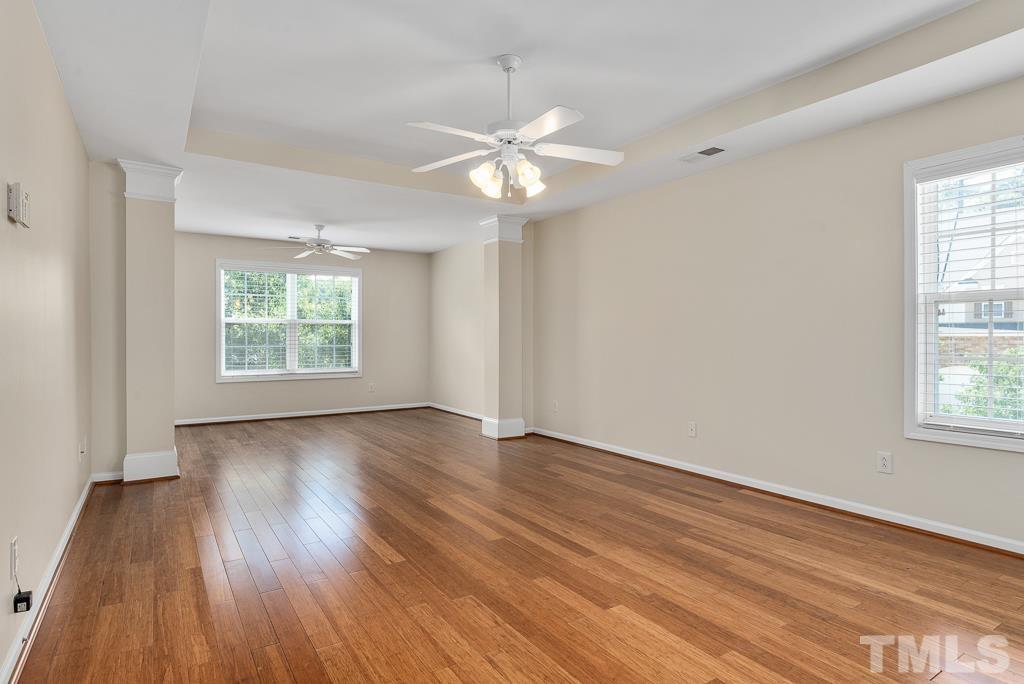 110 Castlebar Lane Durham, NC 27713 - Photo 18 of 32 wooden floor in an empty room with a window