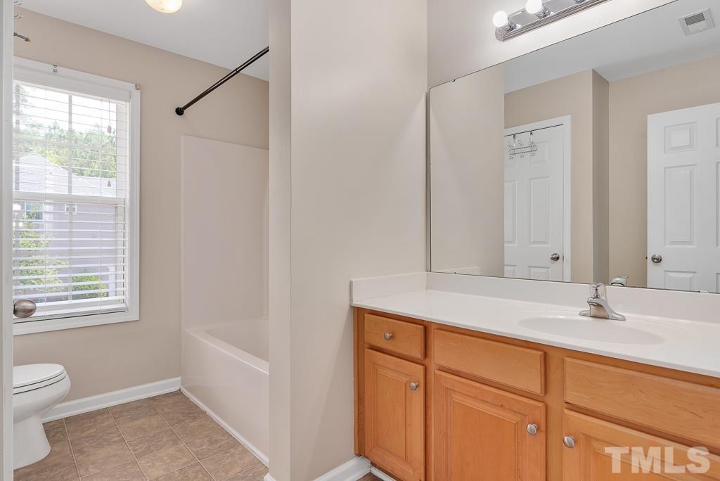 110 Castlebar Lane Durham, NC 27713 - Photo 20 of 32 a bathroom with a sink and a toilet