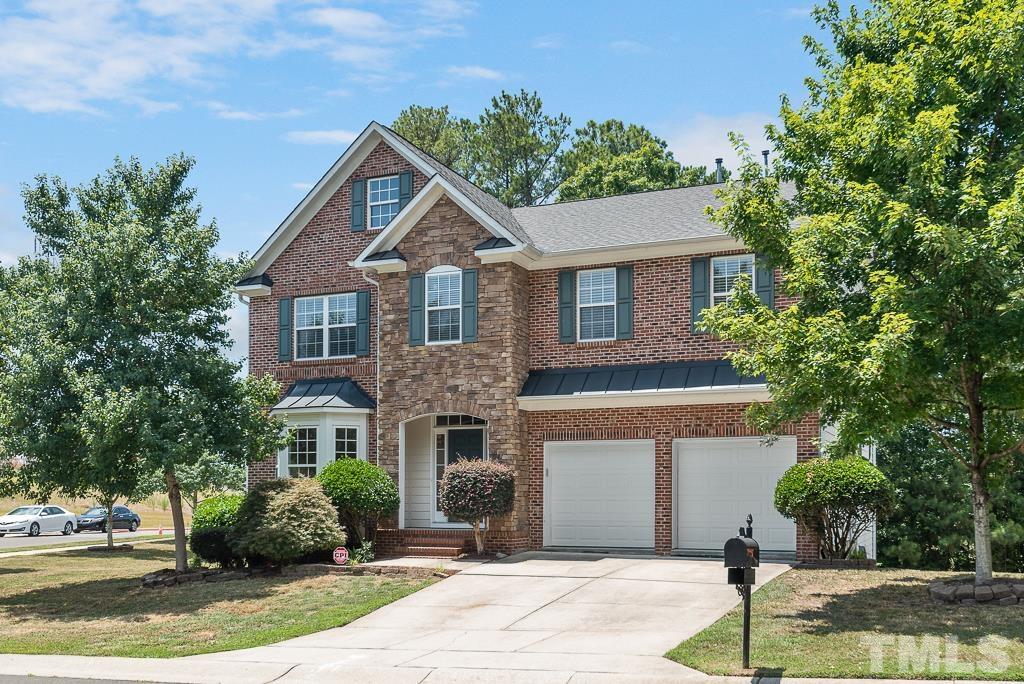 110 Castlebar Lane Durham, NC 27713 - Photo 2 of 32 a front view of a house with garden