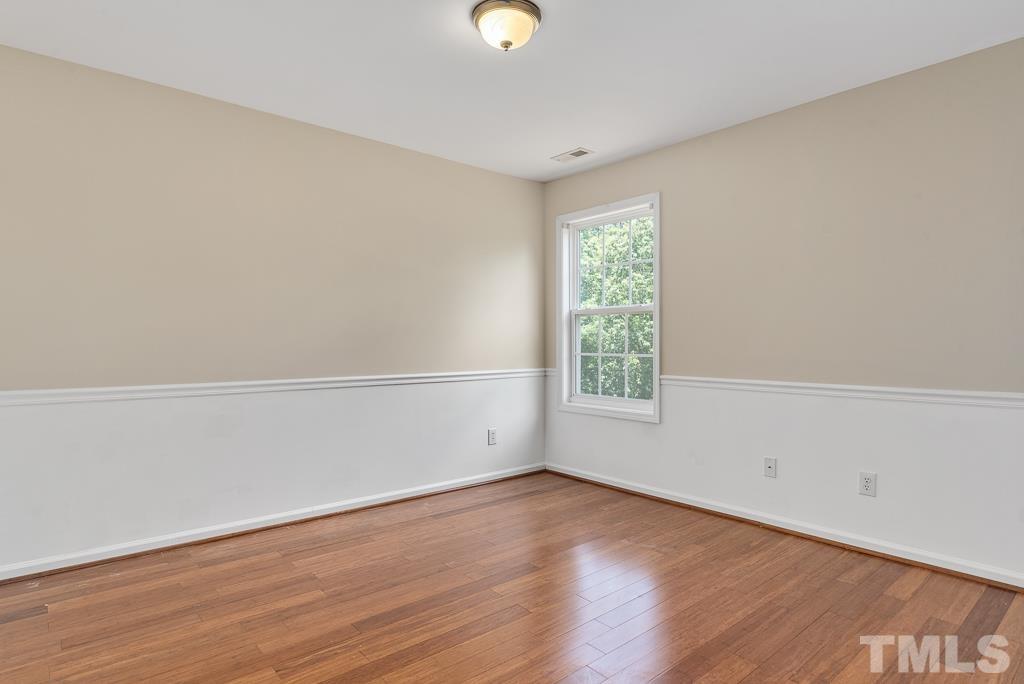 110 Castlebar Lane Durham, NC 27713 - Photo 24 of 32 a view of a room with wooden floor and window