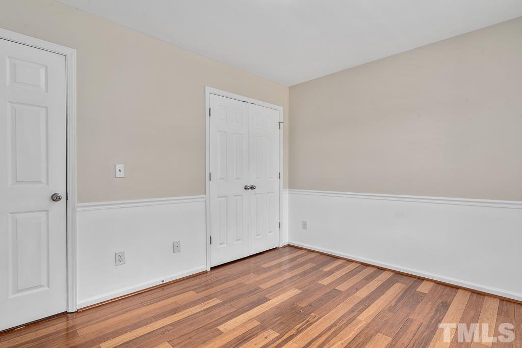 110 Castlebar Lane Durham, NC 27713 - Photo 25 of 32 a view of a room with wooden floor
