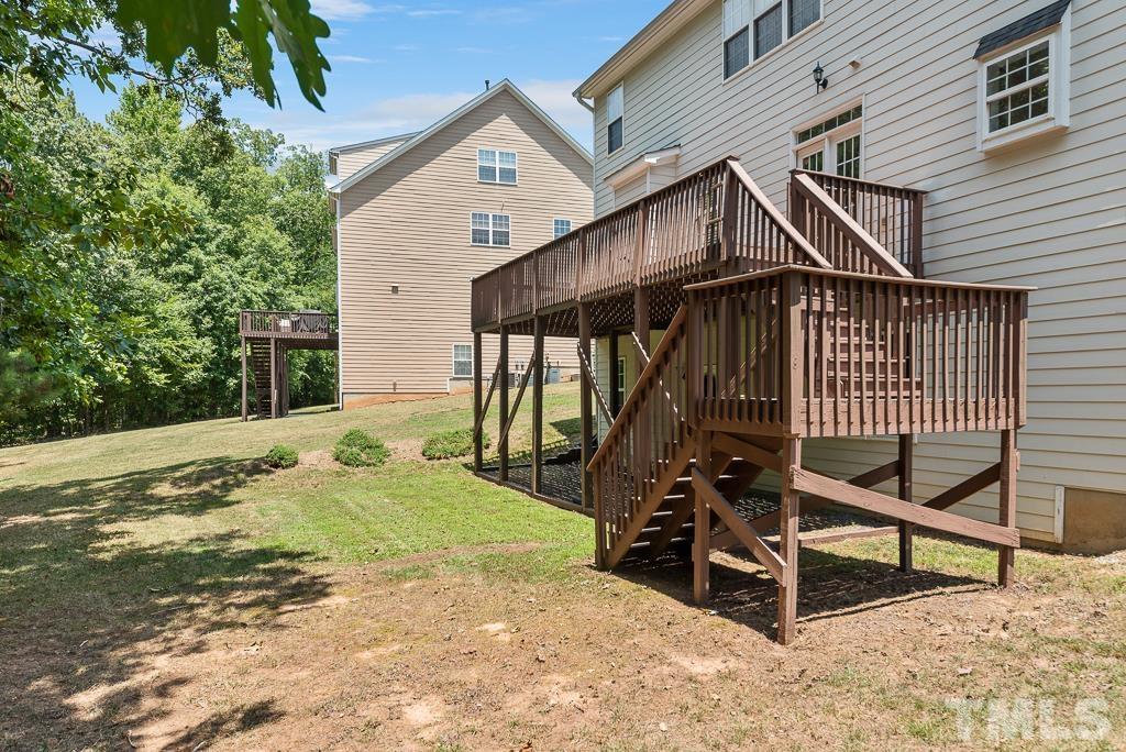 110 Castlebar Lane Durham, NC 27713 - Photo 32 of 32 a view of a house with backyard and sitting area
