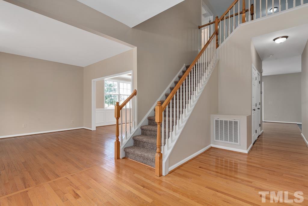 110 Castlebar Lane Durham, NC 27713 - Photo 4 of 32 a view of an entryway with wooden floor