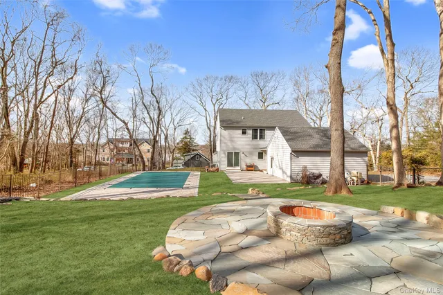 a view of a park with large trees
