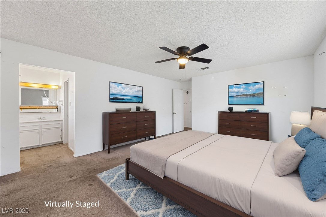 720 Sam Jonas Drive Las Vegas, NV 89145 - Photo 13 of 21 VIRTUALLY STAGED PRIMARY BEDROOM