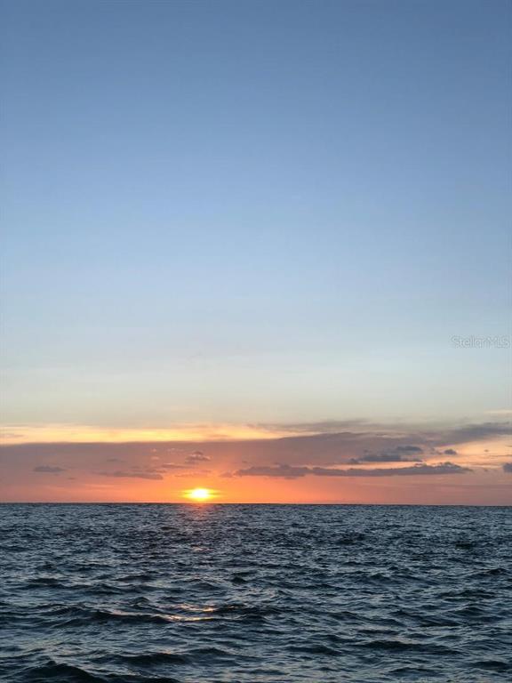 9060 Blind Pass Road, Unit 25 St. Pete Beach, FL 33706 - Photo 24 of 25 a view of an ocean