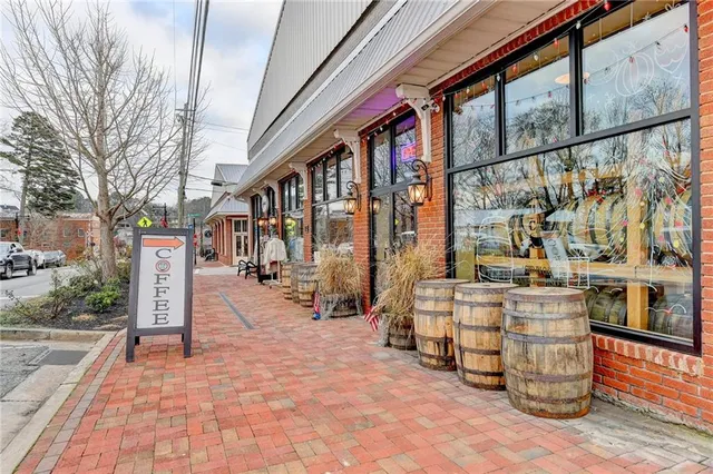 a view of a building with sitting area