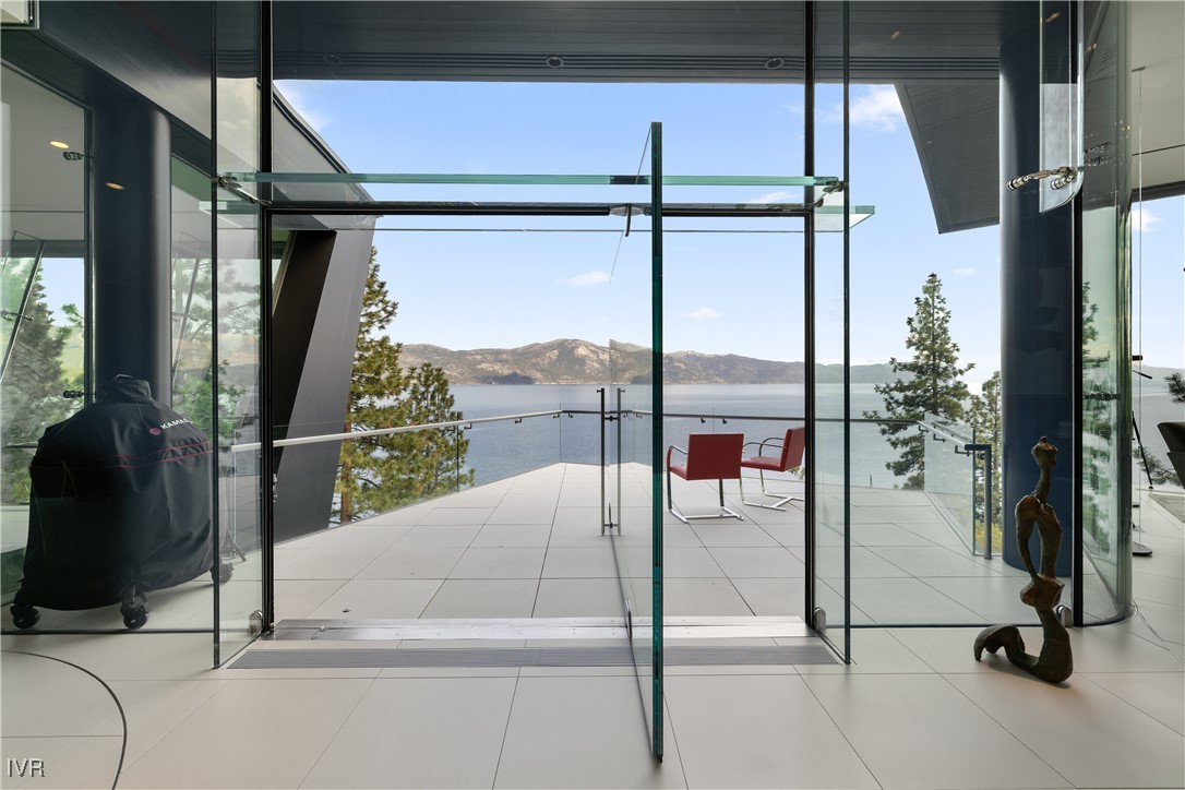 580 Gonowabie Road Crystal Bay, NV 89402 - Photo 12 of 50 a very nice looking room with a glass door shower