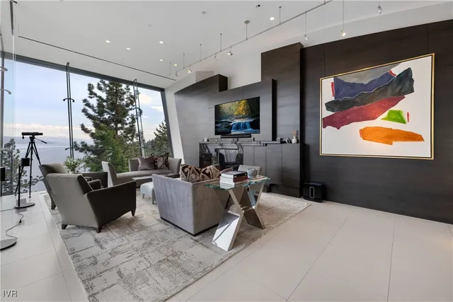 a living room with couch guitar and outer view