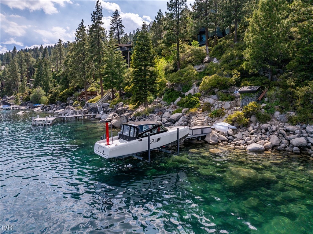 580 Gonowabie Road Crystal Bay, NV 89402 - Photo 3 of 50 a view of a backyard with plants and a garden