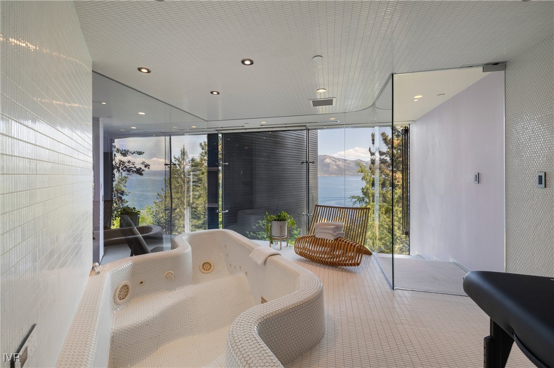 580 Gonowabie Road Crystal Bay, NV 89402 - Photo 32 of 50 a living room with furniture and a large window