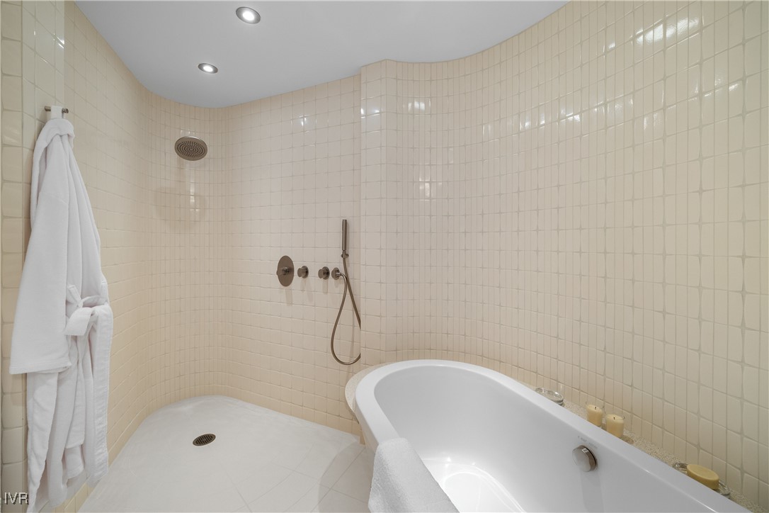 580 Gonowabie Road Crystal Bay, NV 89402 - Photo 39 of 50 a bathroom with a bathtub and shower