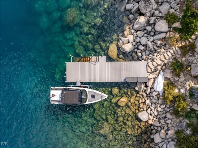 a view of a backyard with a garden and plants