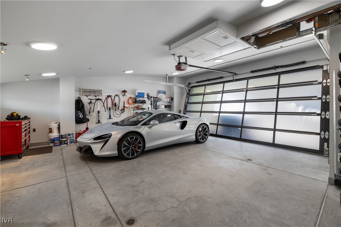 580 Gonowabie Road Crystal Bay, NV 89402 - Photo 48 of 50 a view of a garage with clothes and racks