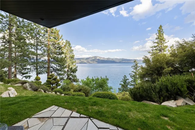 a view of a lake with a big yard