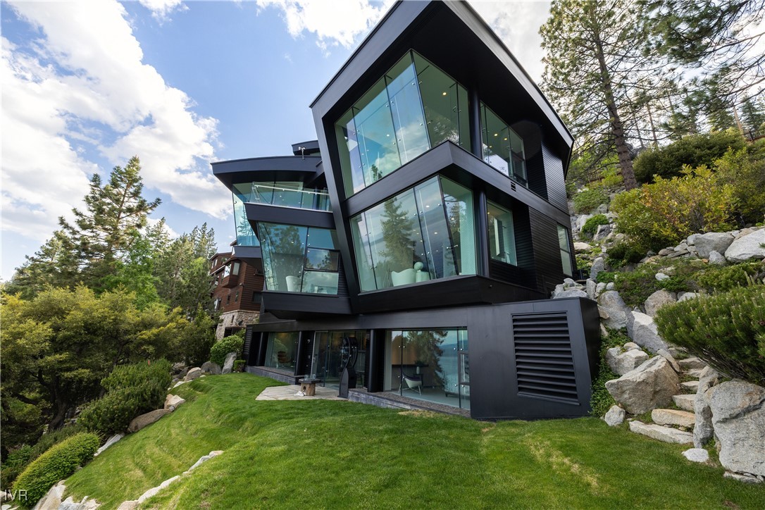 580 Gonowabie Road Crystal Bay, NV 89402 - Photo 5 of 50 a view of a house with a yard and plants