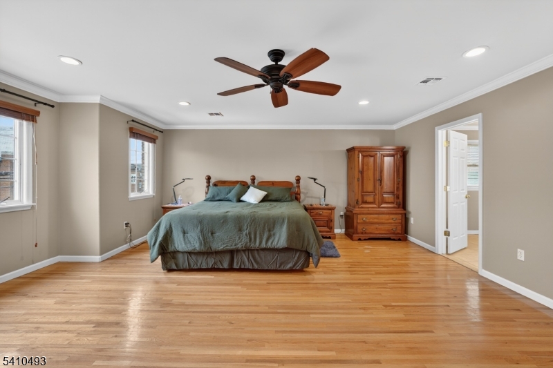 1109 Overlook Terrace Union, NJ 07083 - Photo 13 of 41 a bedroom with a bed and wooden floor