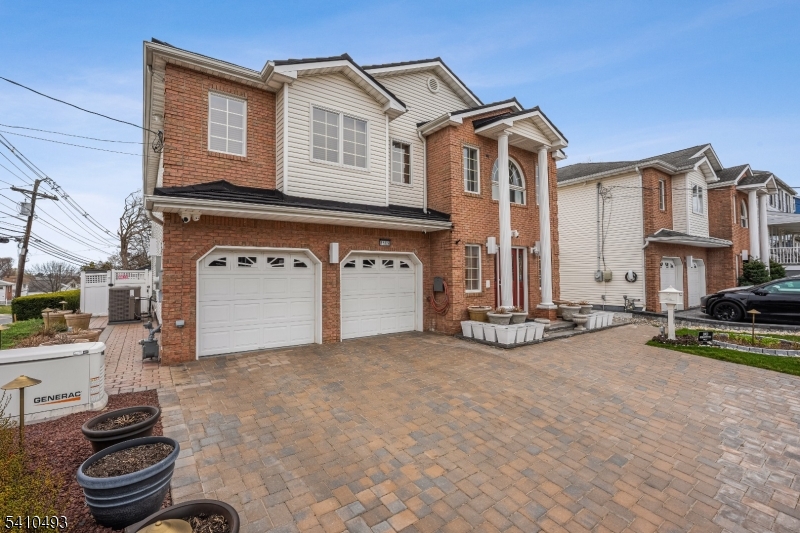 1109 Overlook Terrace Union, NJ 07083 - Photo 35 of 41 a view of a house with a barbeque and large trees