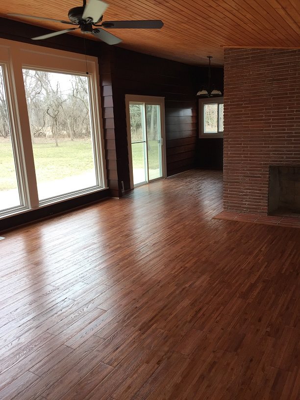 4985 Freeport Road Rockton, IL 61072 - Photo 15 of 24 a view of an empty room with wooden floor and a window