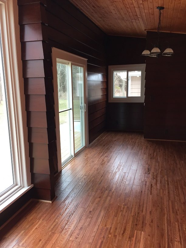 4985 Freeport Road Rockton, IL 61072 - Photo 4 of 24 a view of an empty room with wooden floor and a window