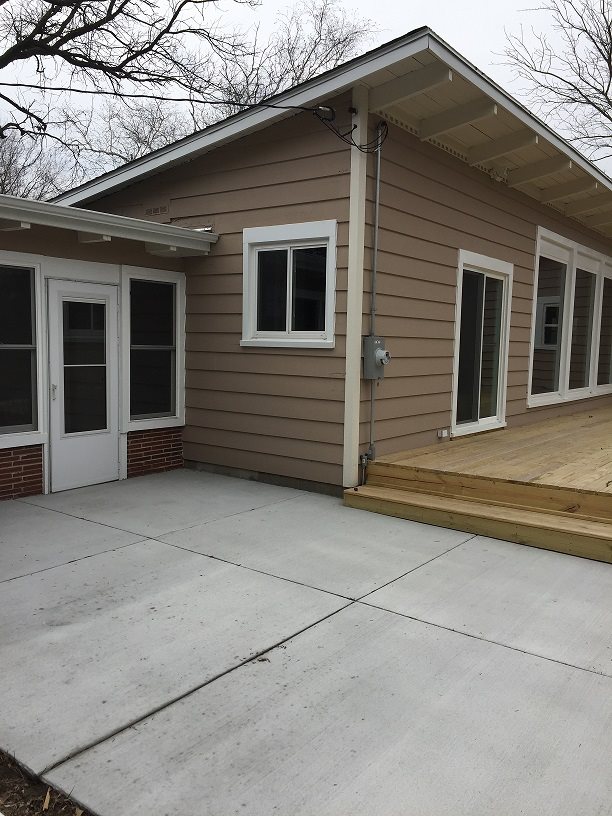 4985 Freeport Road Rockton, IL 61072 - Photo 9 of 24 a front view of a house with a large tree