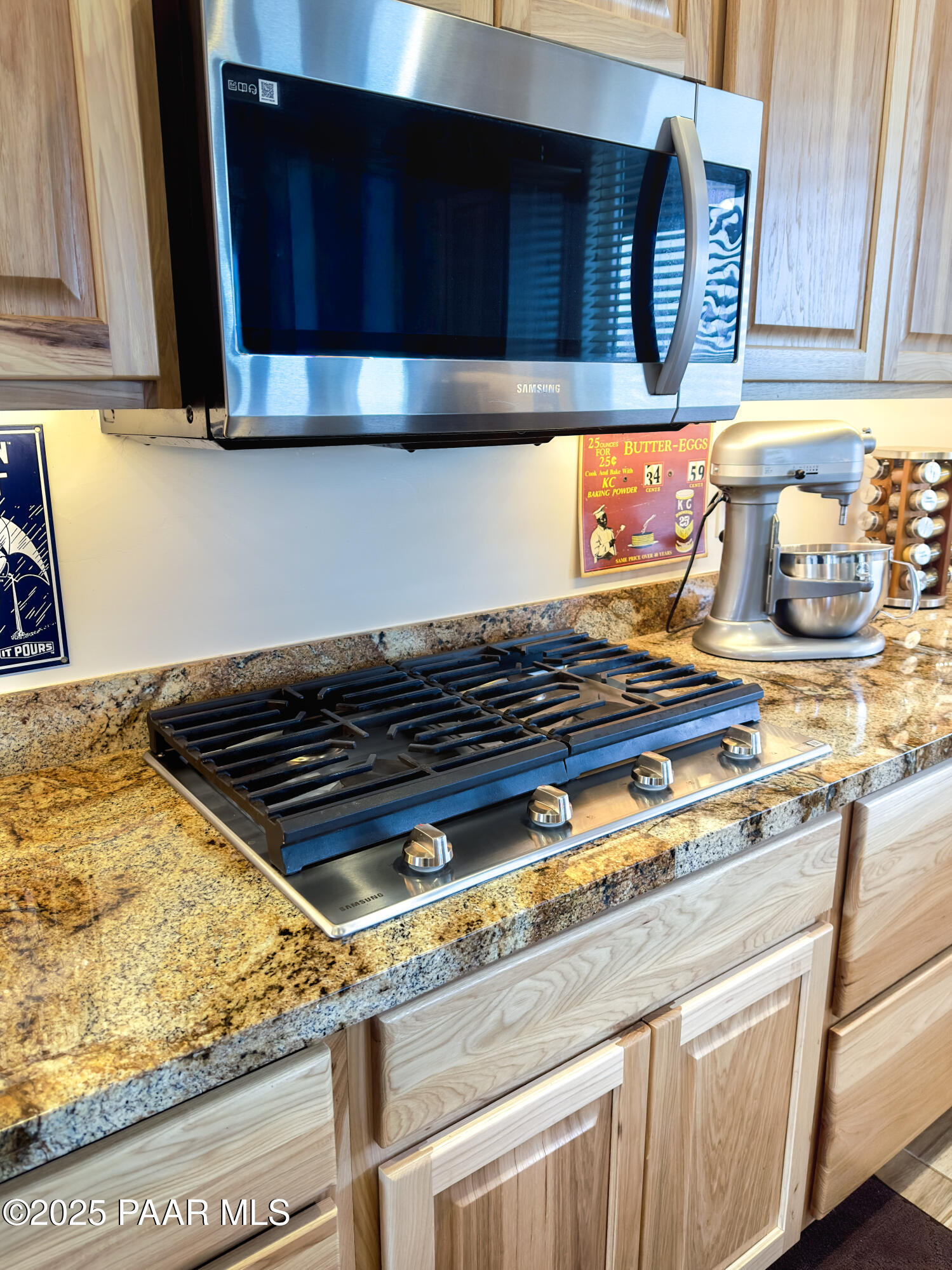 9860 North Loper Road Prescott Valley, AZ 86315 - Photo 15 of 53 a stove top oven sitting inside of a kitchen