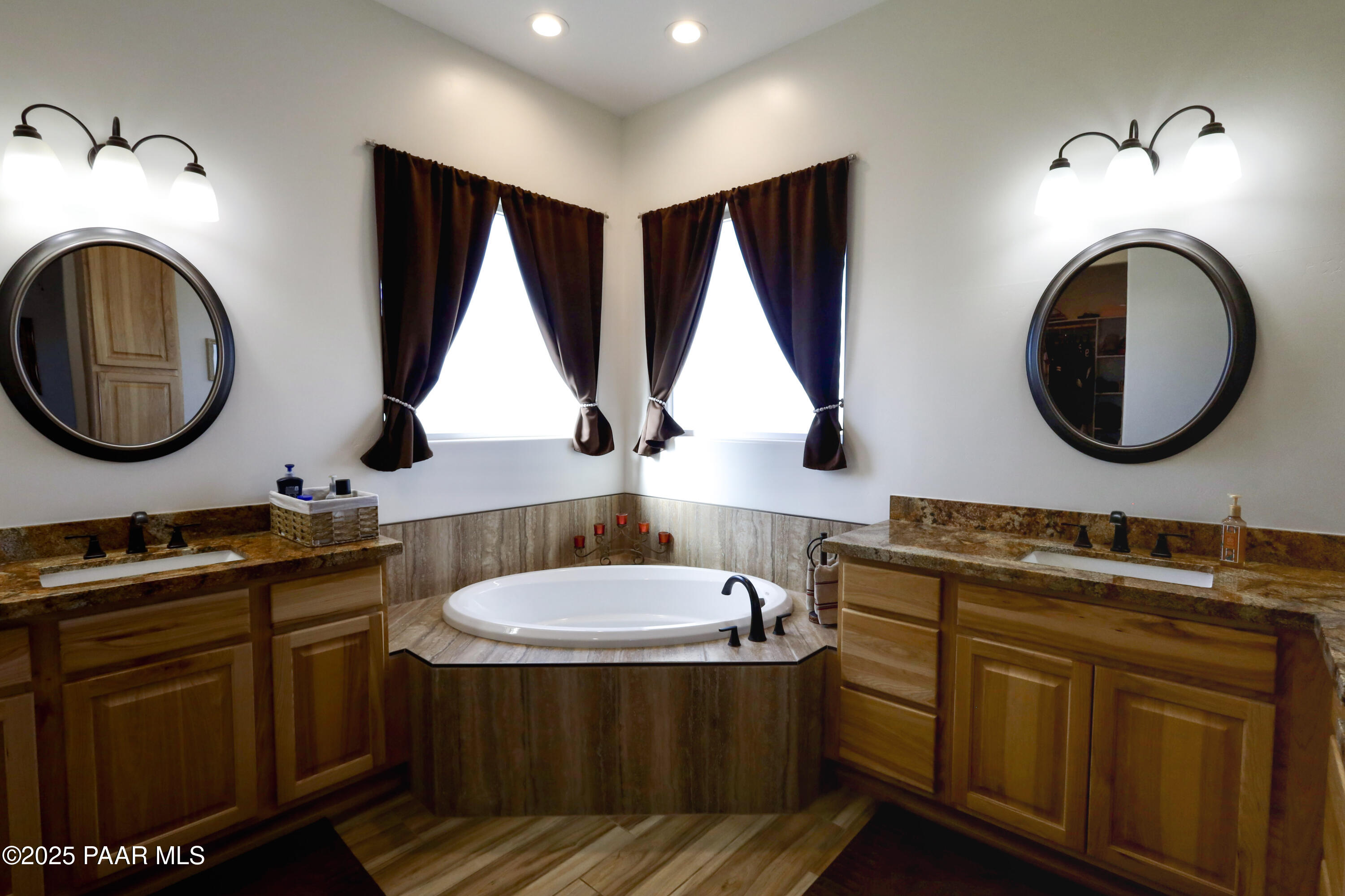 9860 North Loper Road Prescott Valley, AZ 86315 - Photo 36 of 53 a bathroom with a sink and a mirror