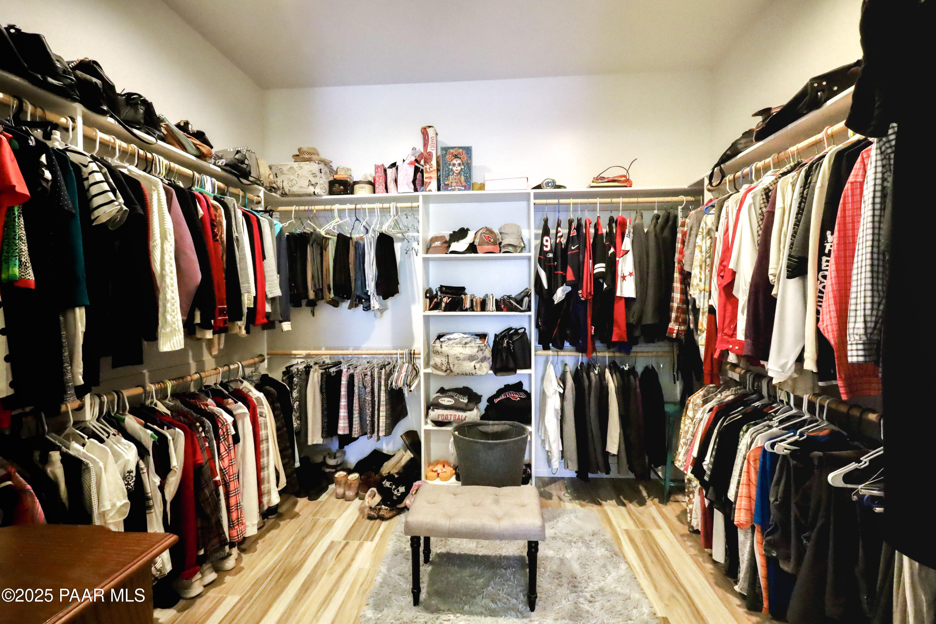 9860 North Loper Road Prescott Valley, AZ 86315 - Photo 42 of 53 a view of walk in closet with clothes and shoes