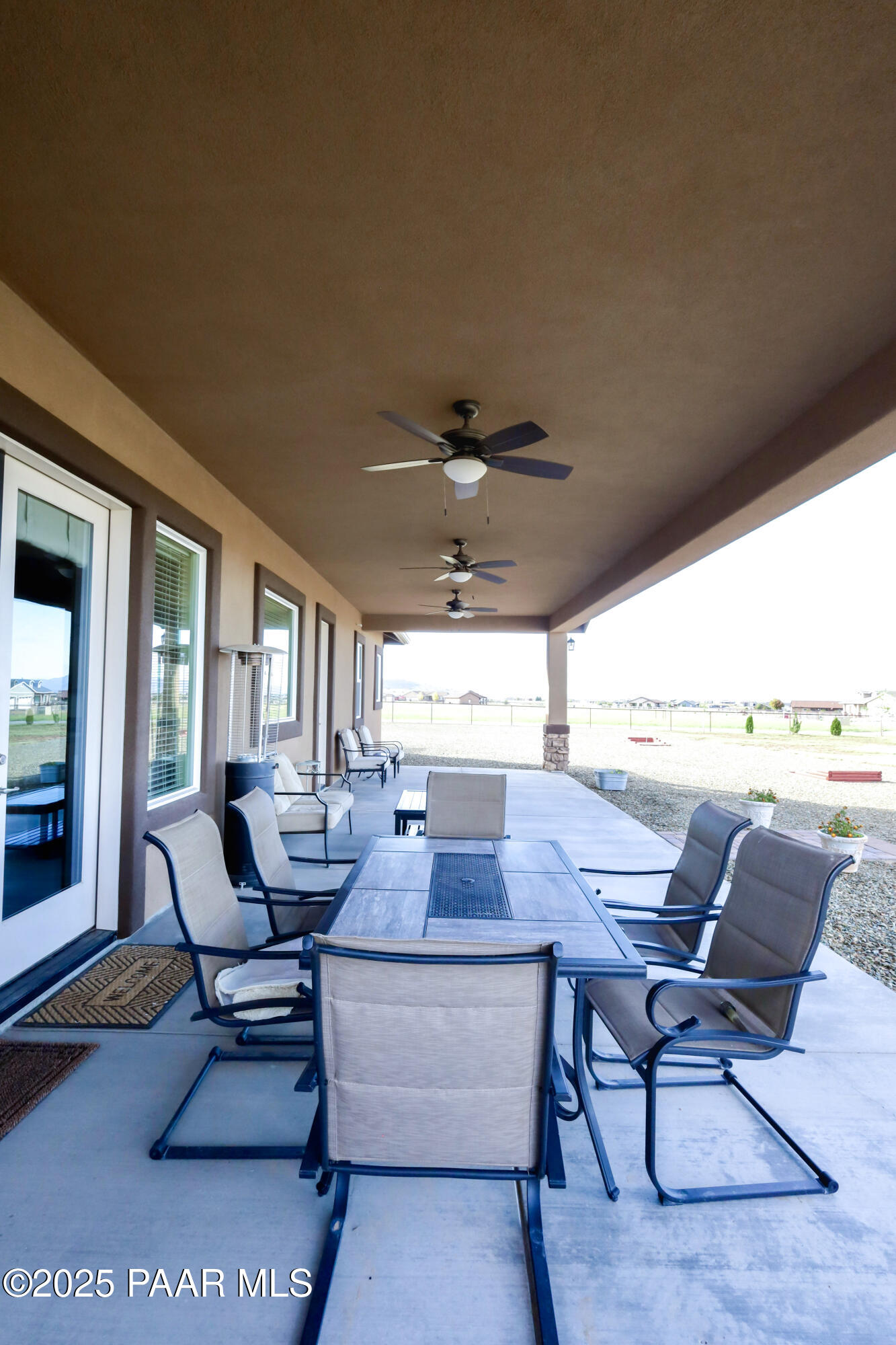 9860 North Loper Road Prescott Valley, AZ 86315 - Photo 45 of 53 a living room with furniture and a large window