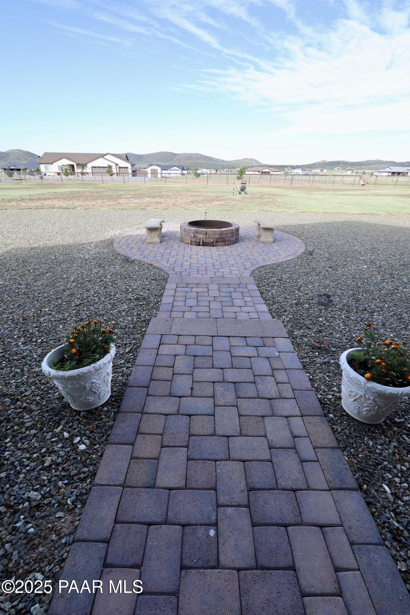9860 North Loper Road Prescott Valley, AZ 86315 - Photo 46 of 53 a view of a lake and a yard