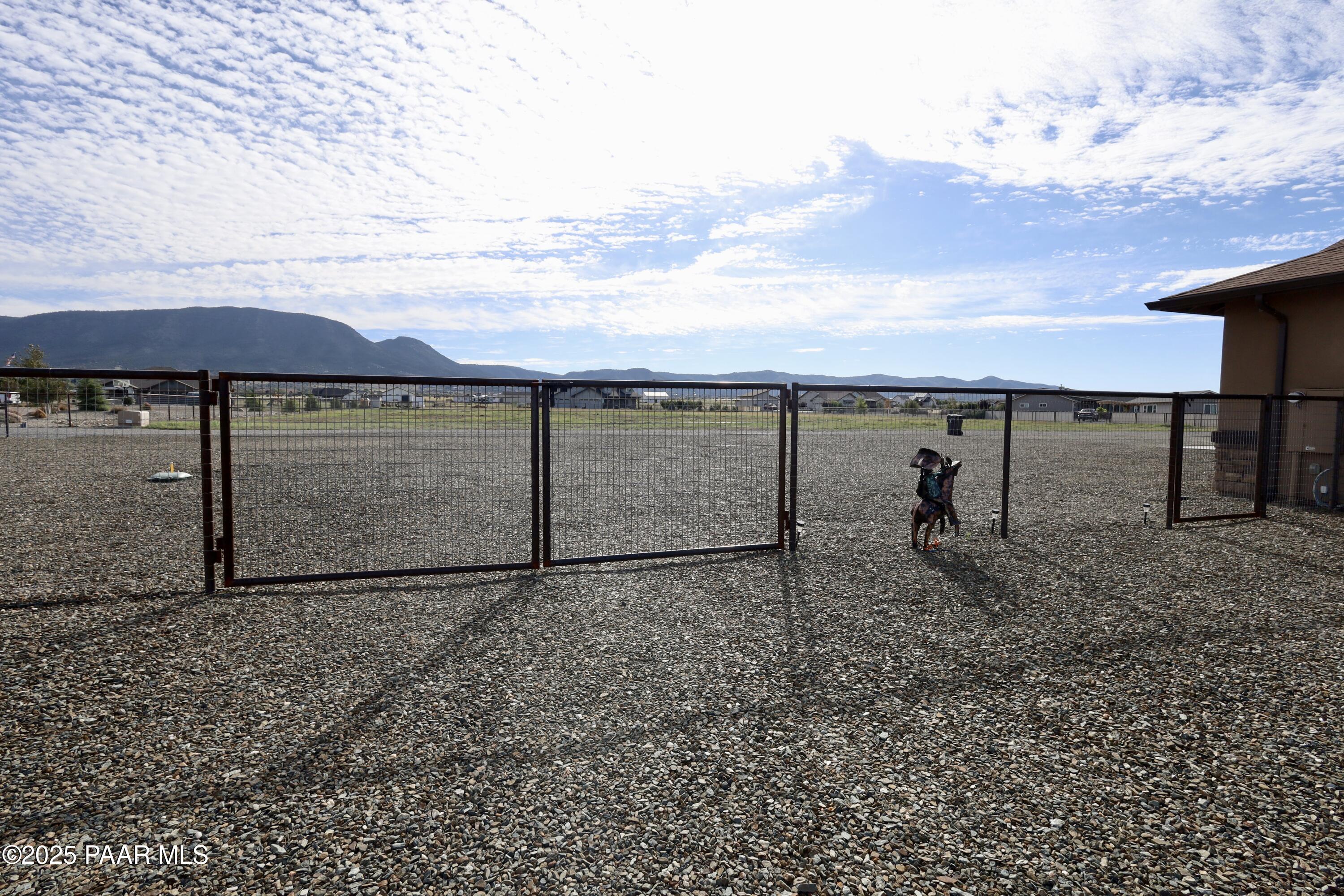 9860 North Loper Road Prescott Valley, AZ 86315 - Photo 50 of 53 a view of a yard with a roof deck