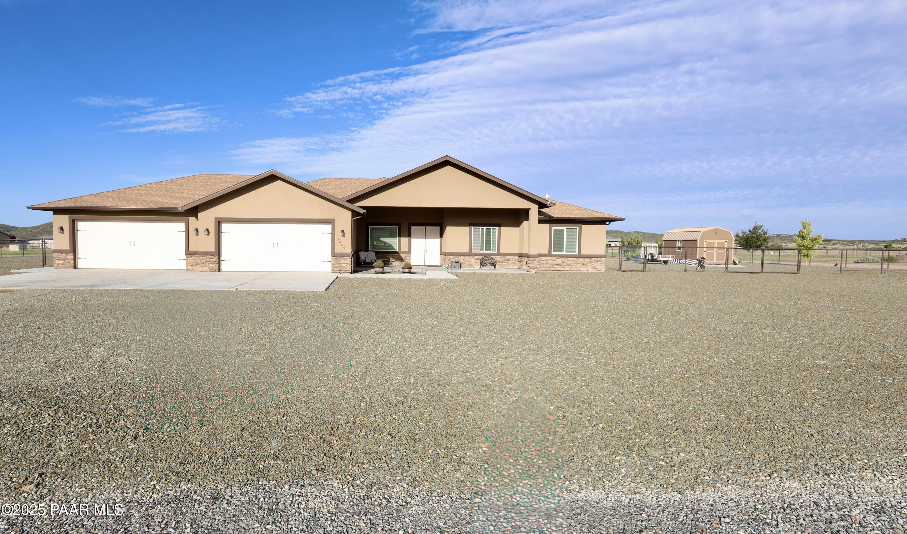 9860 North Loper Road Prescott Valley, AZ 86315 - Photo 5 of 53 a front view of a house with a yard