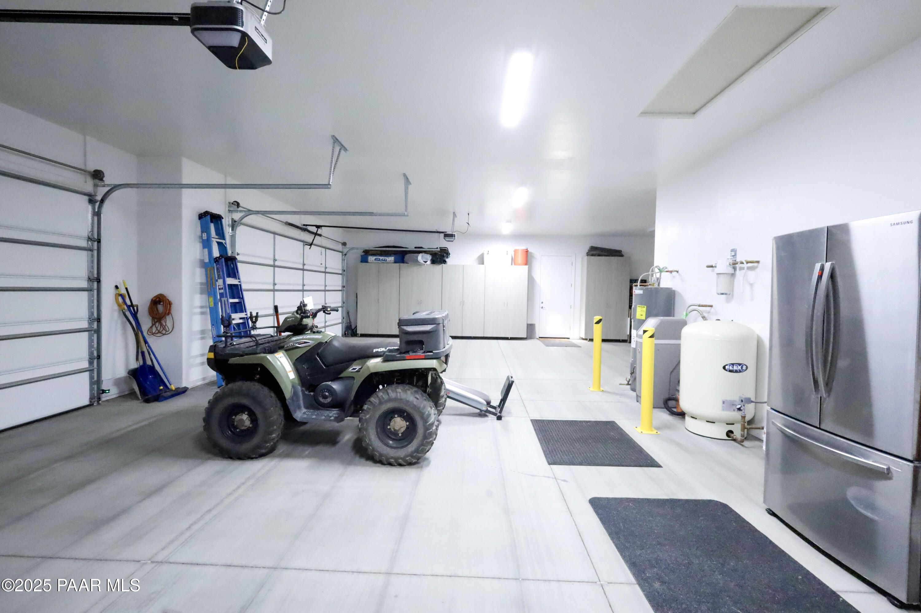 9860 North Loper Road Prescott Valley, AZ 86315 - Photo 52 of 53 a kitchen with refrigerator and washer