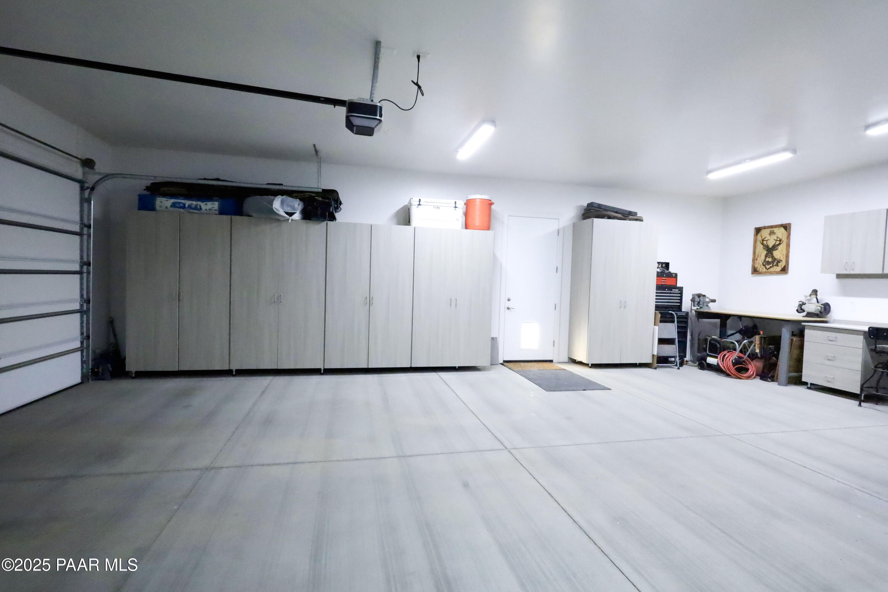 9860 North Loper Road Prescott Valley, AZ 86315 - Photo 53 of 53 a view of a empty room with furniture and a ceiling fan